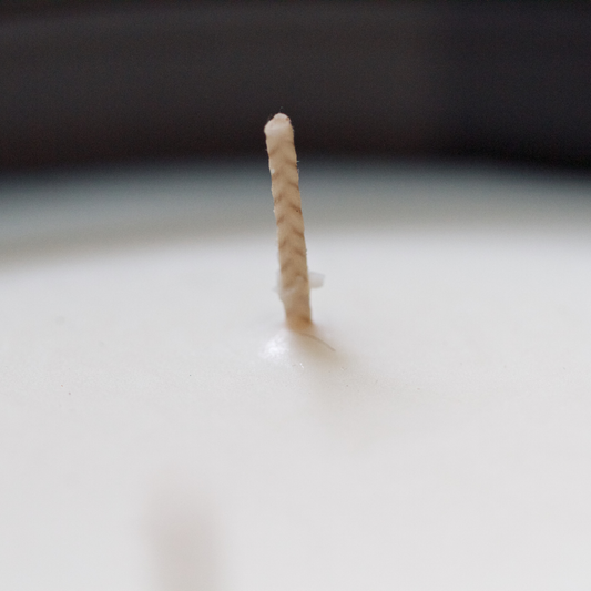 Candle wick in candle glass