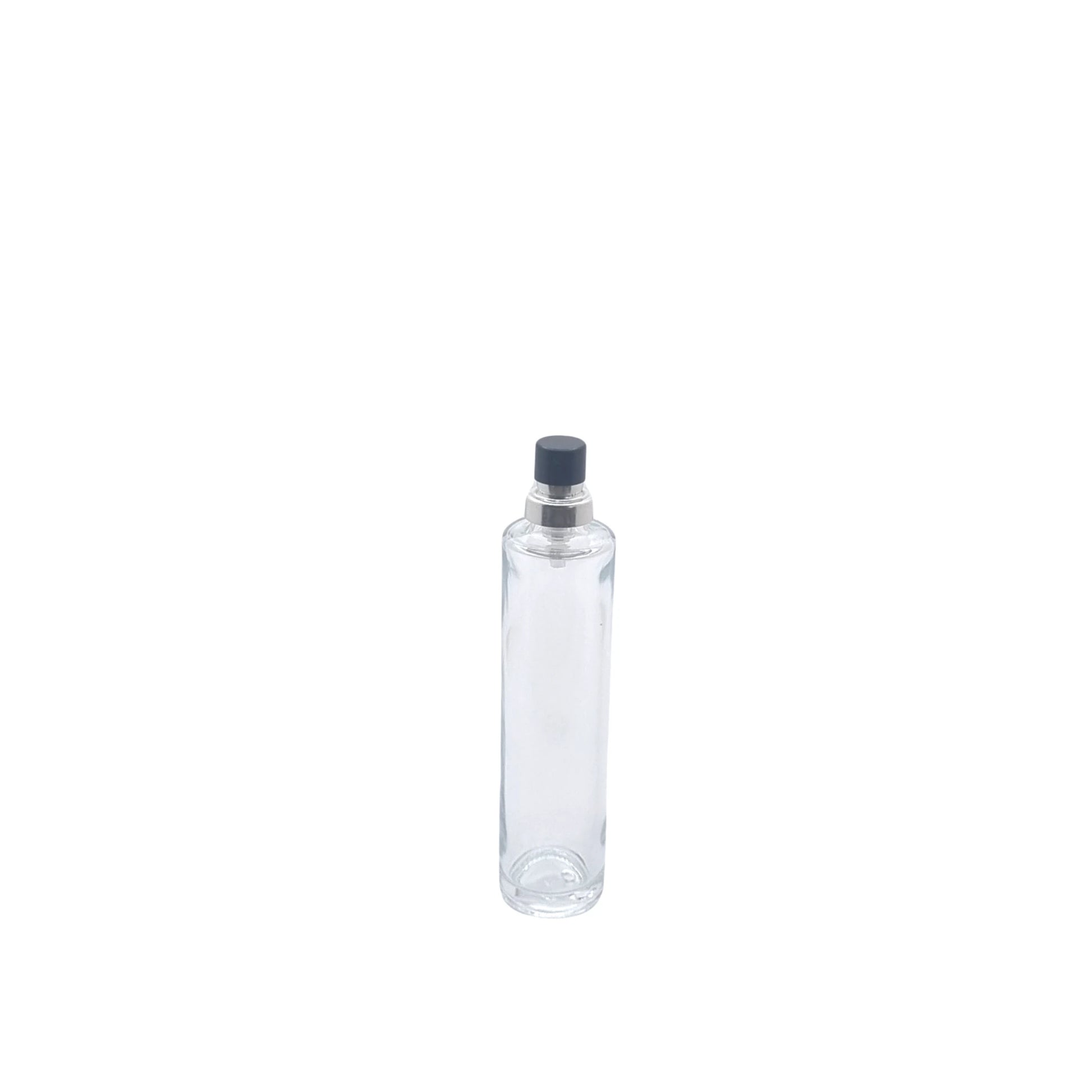Tall thin fragrance bottle in glass