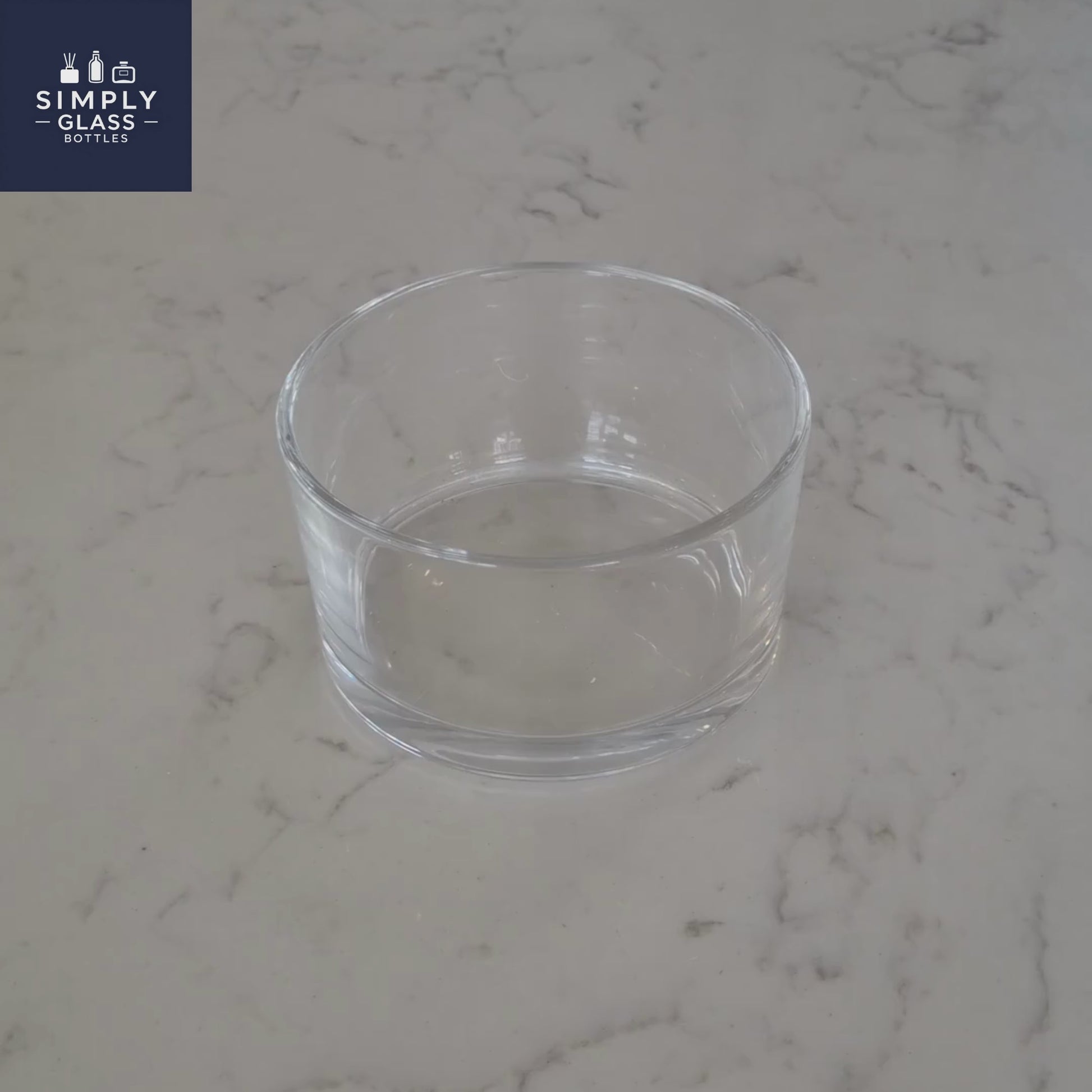 Flat glass dish suitable as candle glass