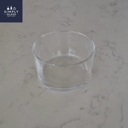 Flat glass dish suitable as candle glass