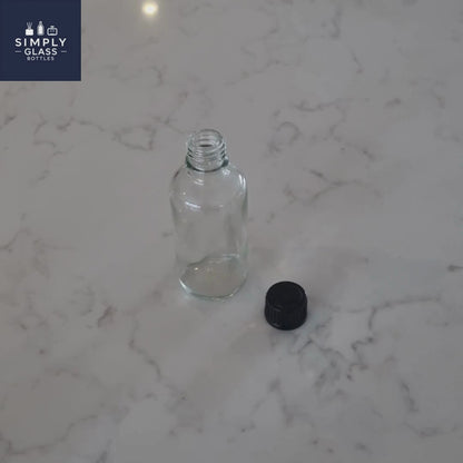 Gl18 Black Boreseal Cap with clear glass dropper bottle