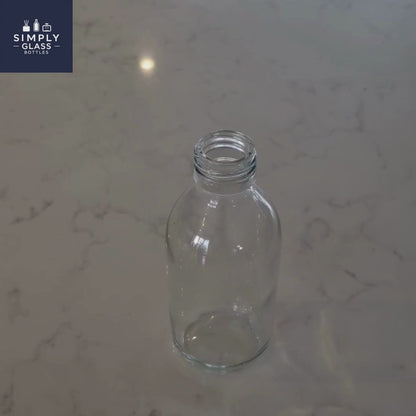 200ml Alpha/Sirop Clear Round Glass Bottle (Pallet Qty 2,345 Units)