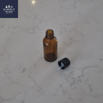 GL18 Black TE Dripper Cap with amber dropper bottle
